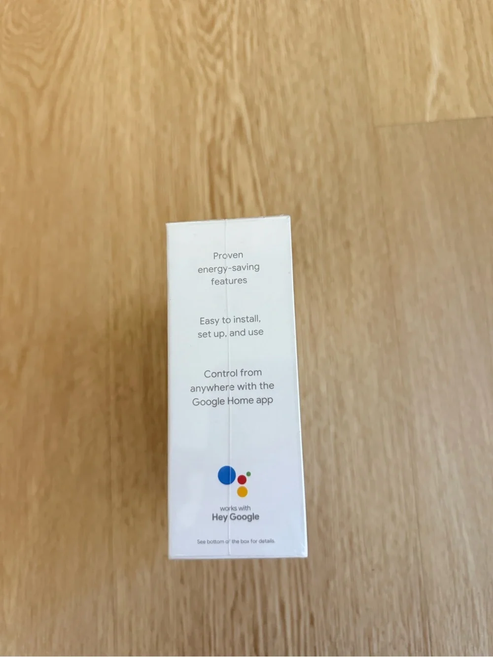 google Nest Thermostat - White Packaging with Gray Thermostat Image